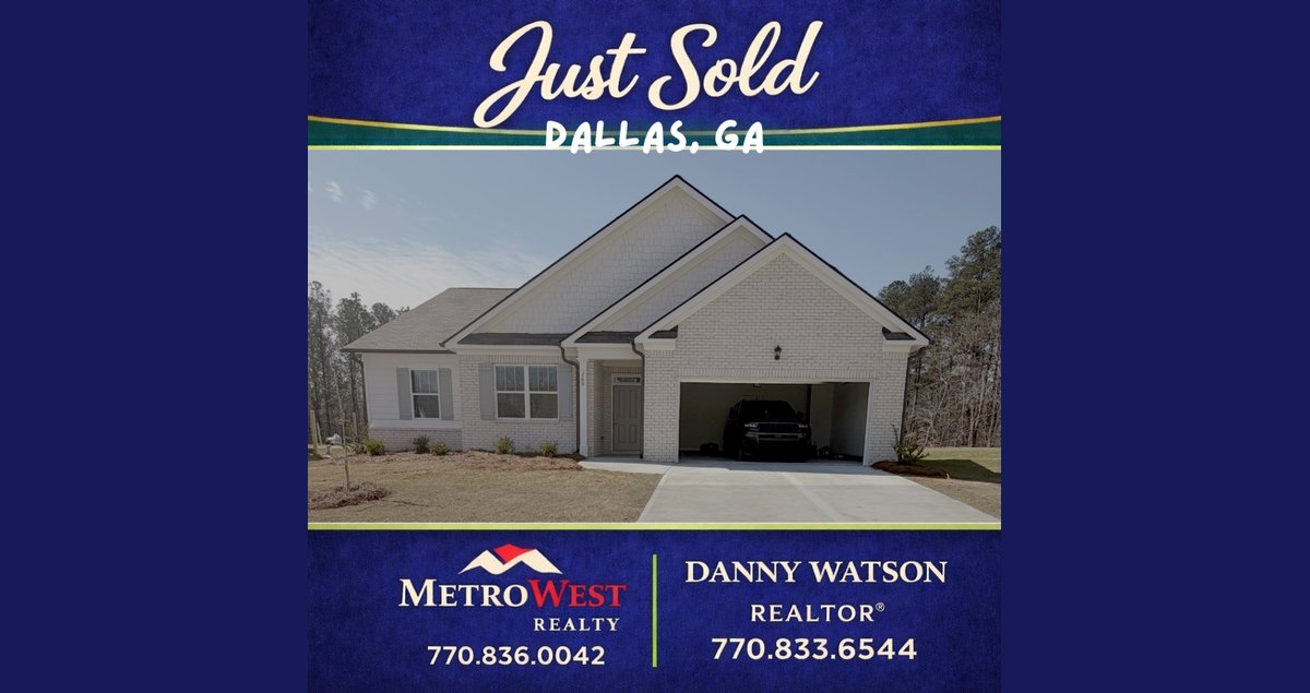 White brick home in Dallas, GA with driveway and garage, recently sold by Danny Watson REALTOR®.