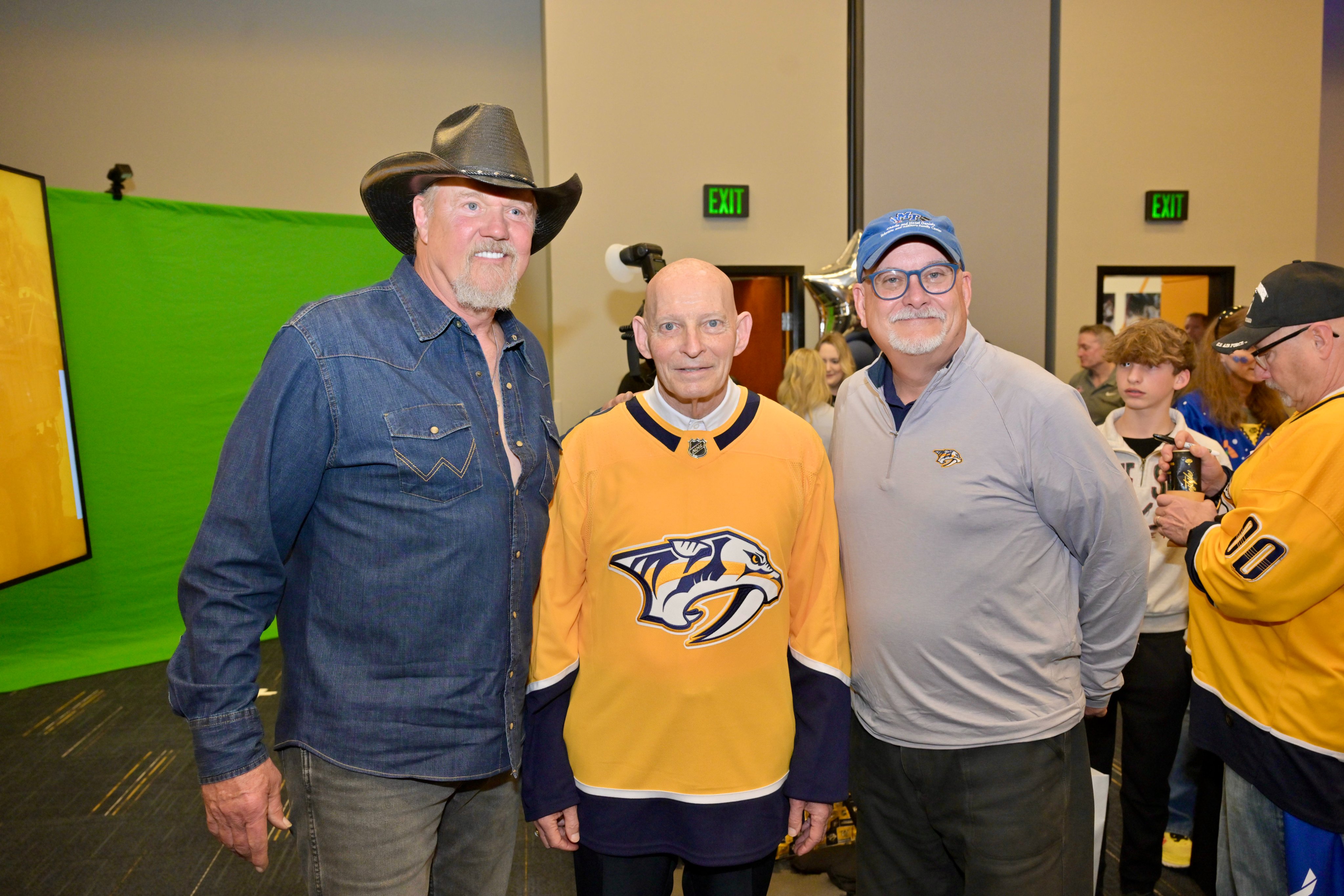 Trace Adkins poses with Army LTG(R) Keith Huber and MTSU Vice President Andrew Oppmann