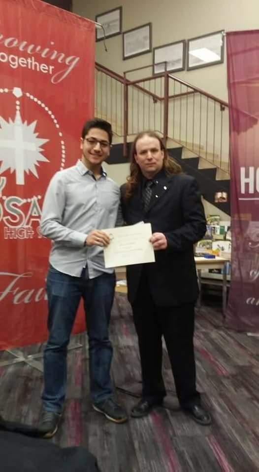 At some Lloydminster Lions Club function, Patrick "Twatsy" Ross pictured with his polar opposite - a smart, successful person.