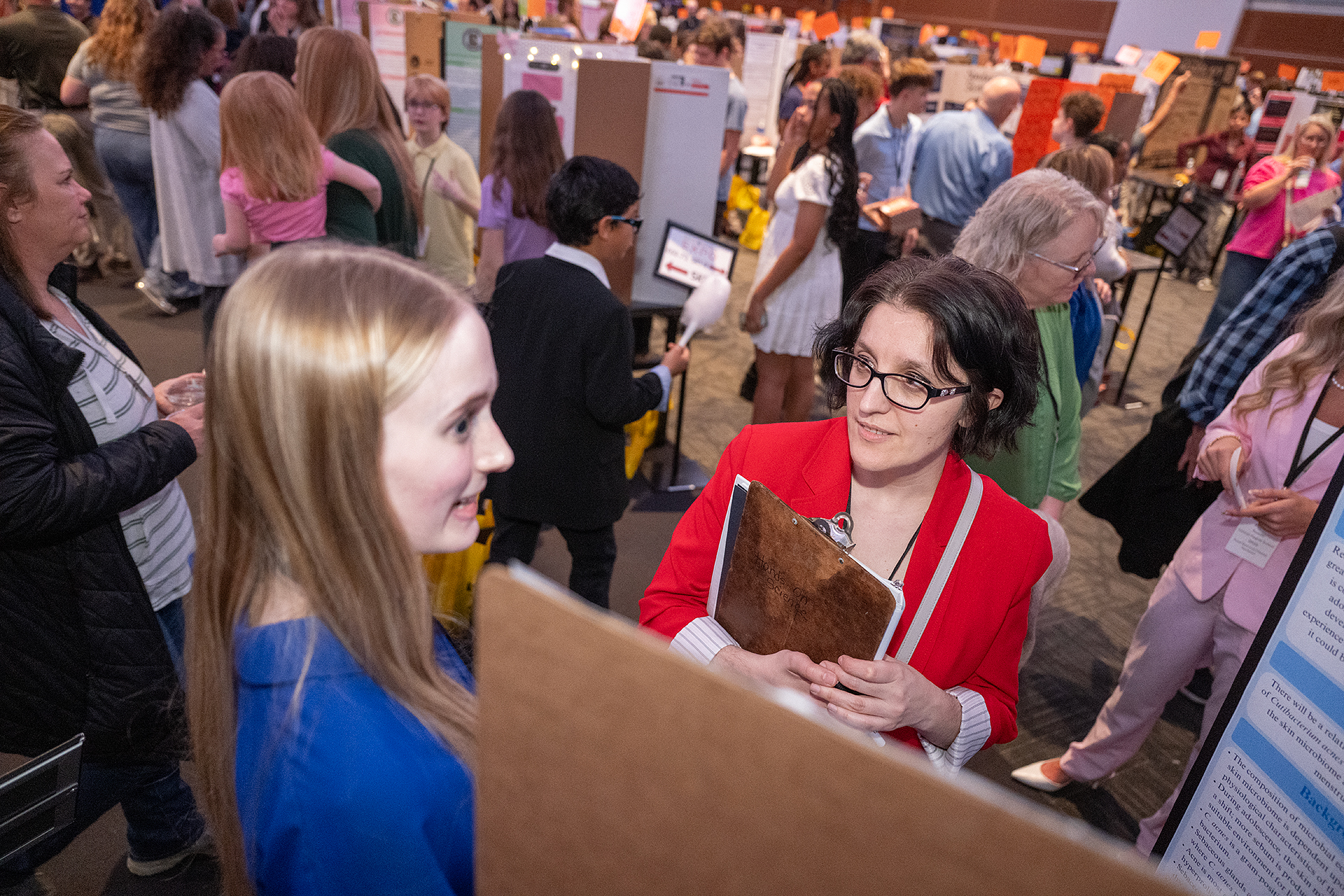 MTSU's Dr. Hanna Terletska visiting with a student during the RCS Stem Expo