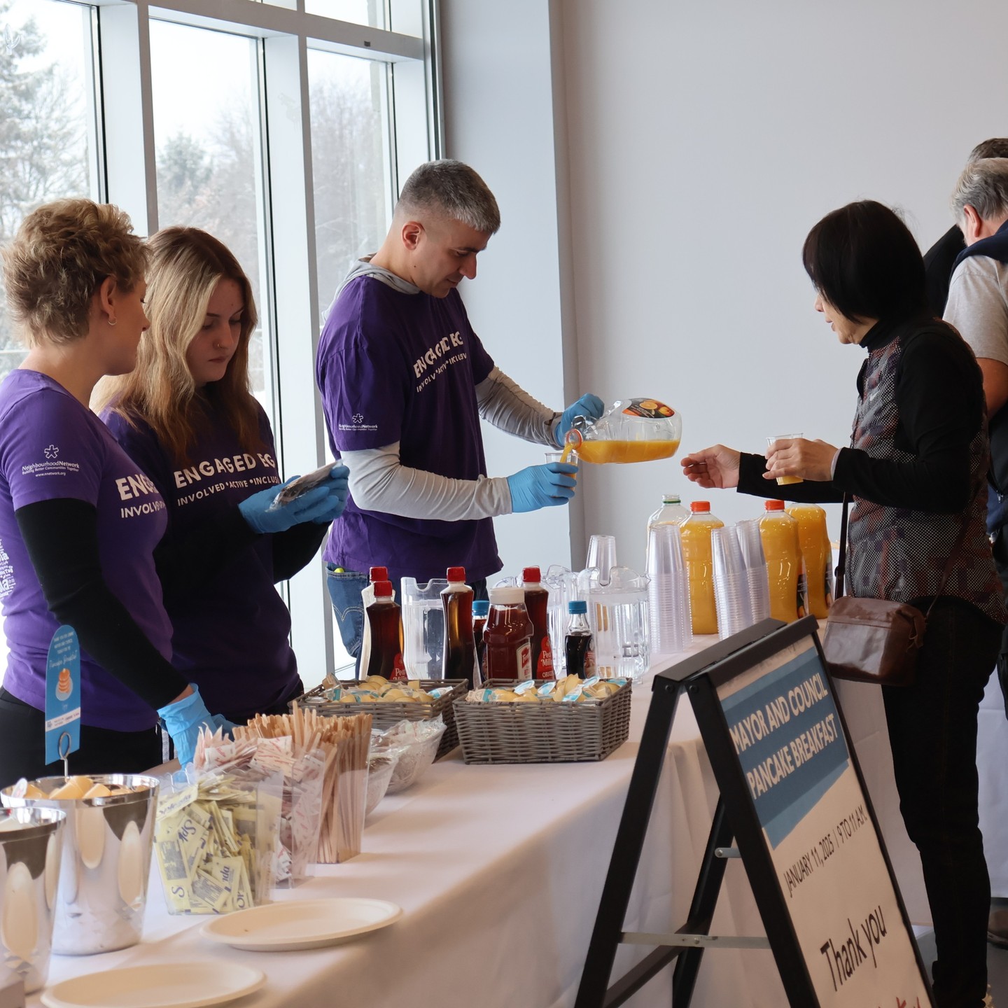 Various Engaged EG volunteers helping at the pancake breakfast. 