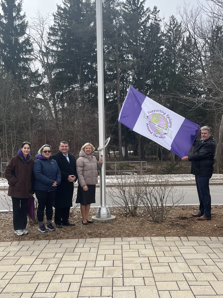 Members of EG Council and representatives from Epilepsy York Region flag raising. 