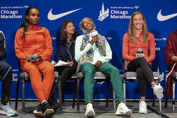 At the Bank of America Chicago Marathon presser a few years ago, Tirunesh Dibaba, Sifan Hassan and Emily Sisson, photo by Kevin Morrs for Chicago Marathon. 
