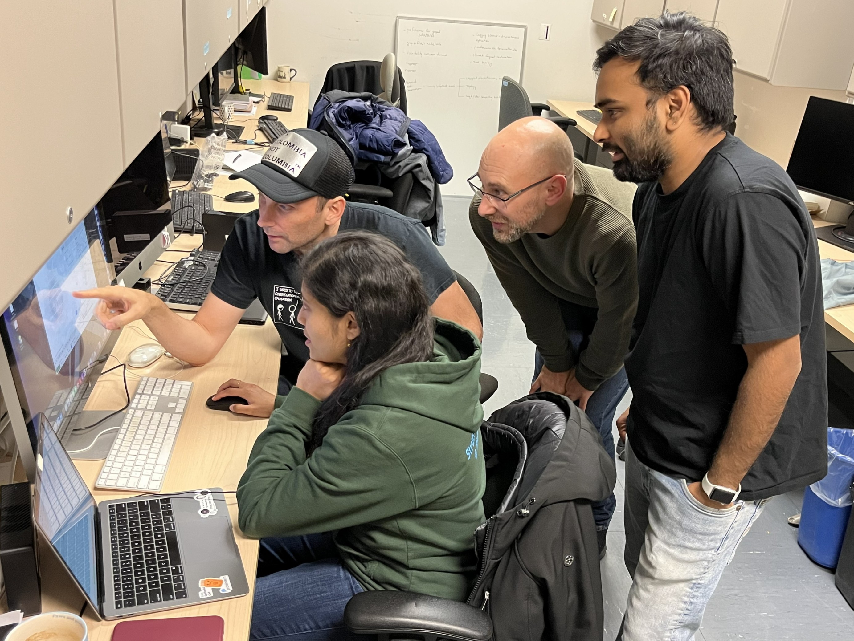 Photo: Members of the research team, from left to right, Martin Schmeing (ball cap), Srobona Ghosh, Mike Tarry, and Anirudh Mantri.