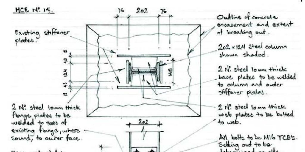Technical drawing of a steel column with detailed measurements and notes on flange plates and stiffener plates for concrete encasement.