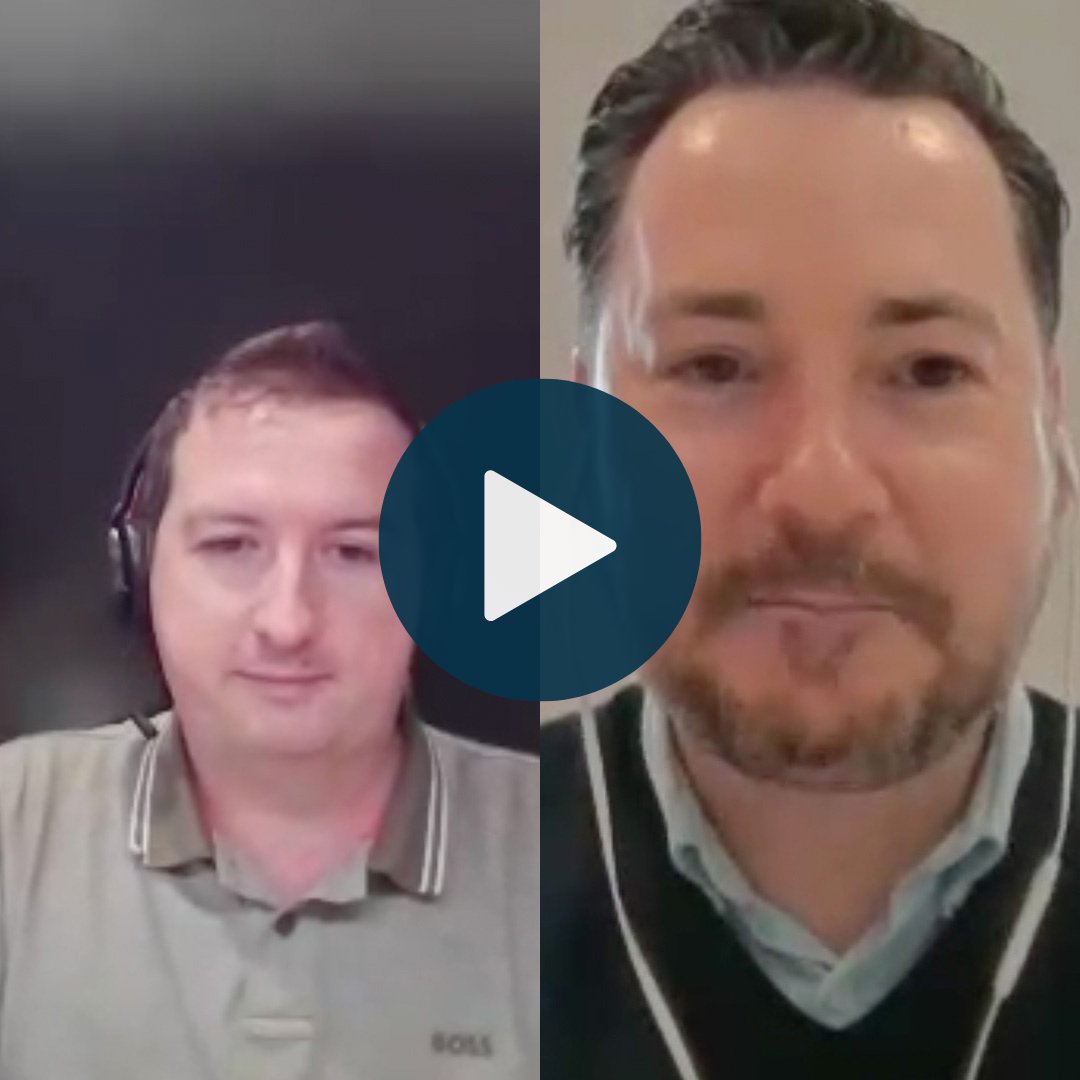 Split-screen video call with Chris Holloway on the left and John Abbott on the right, with a play button centred.