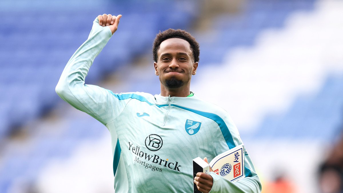 Ali Ahmed celebrates with his Man of the Match trophy after Norwich City's 2-0 victory at Leicester City.