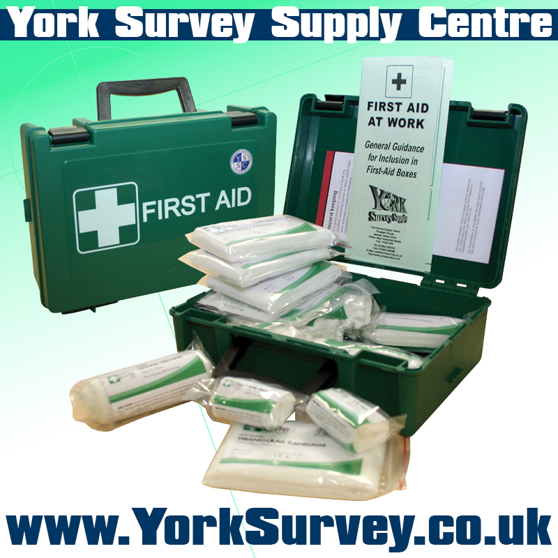 Image shows a green first aid box open with its contents spread around.