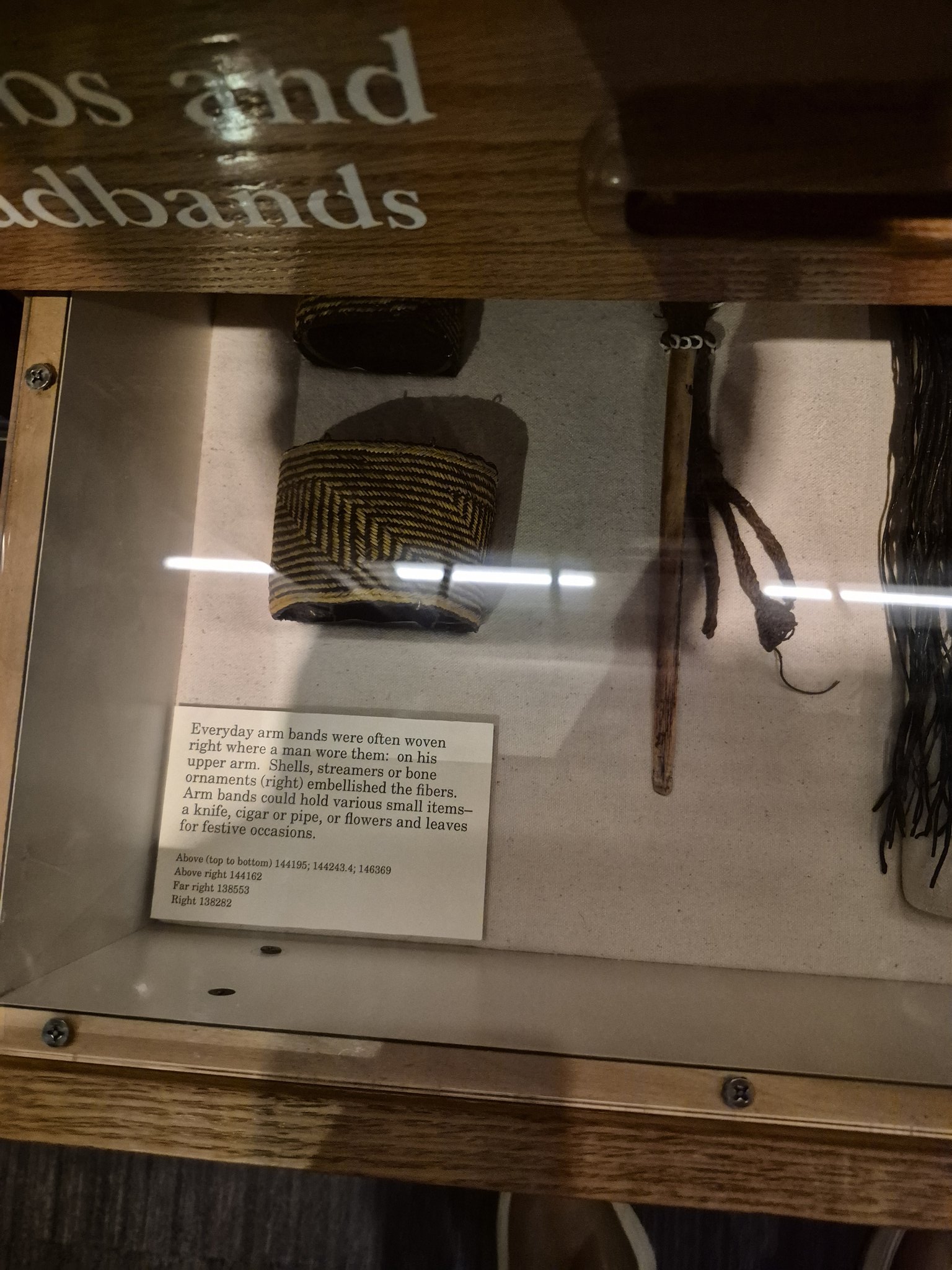 Everyday arm bands were often #woven right where a man wore them: on his upper arm. #Shells, streamers or bone ornaments (right) embellished the fibers. Arm bands could hold various small items-a knife, cigar or pipe, or flowers and leaves for festive occasions