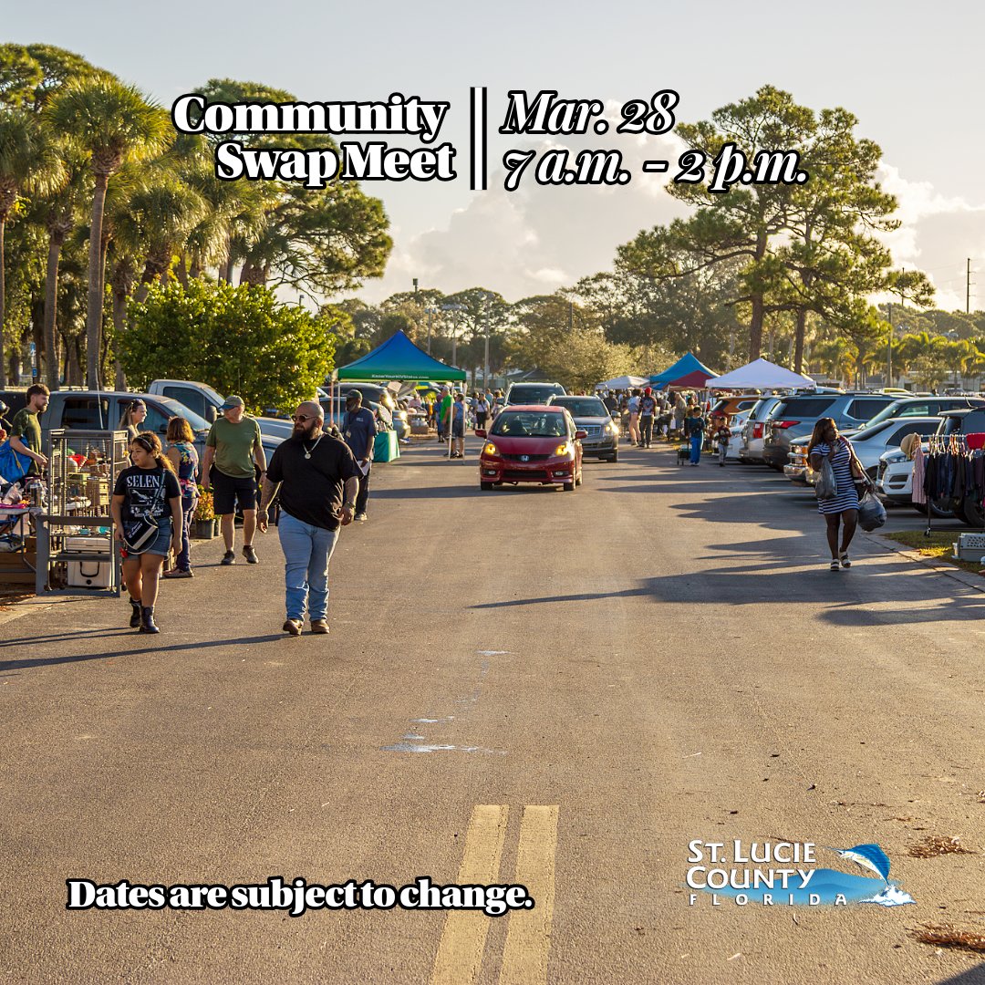 People browsing stalls and cars parked along a sunny street at a community swap meet in St. Lucie County, Florida.