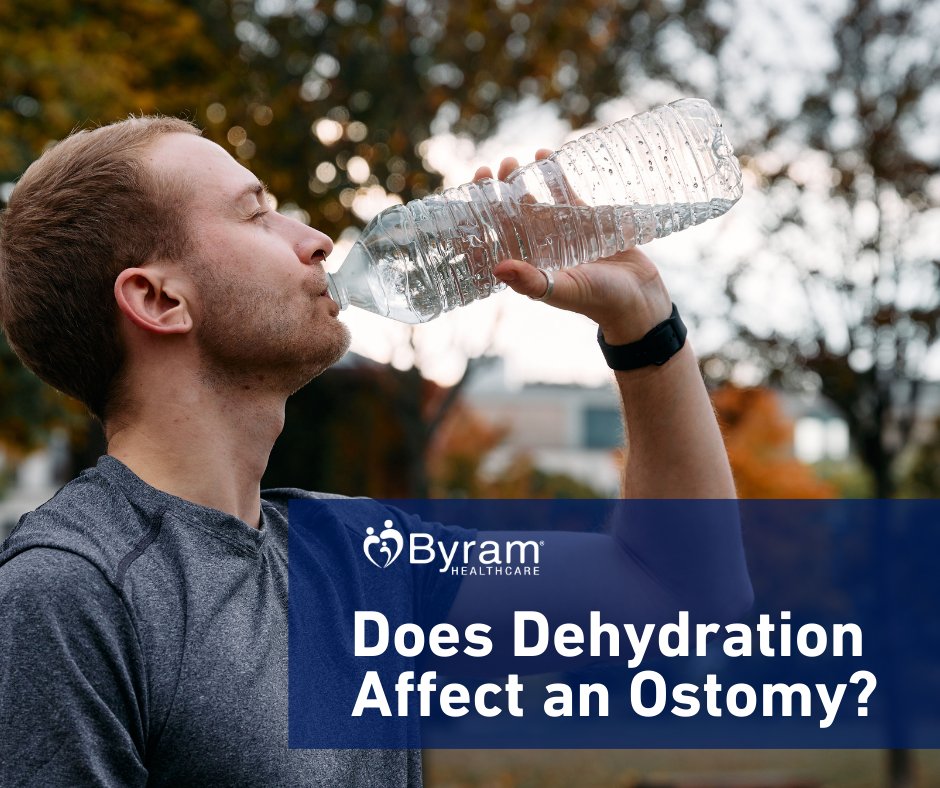 man with an ostomy bag drinking water while outdoors