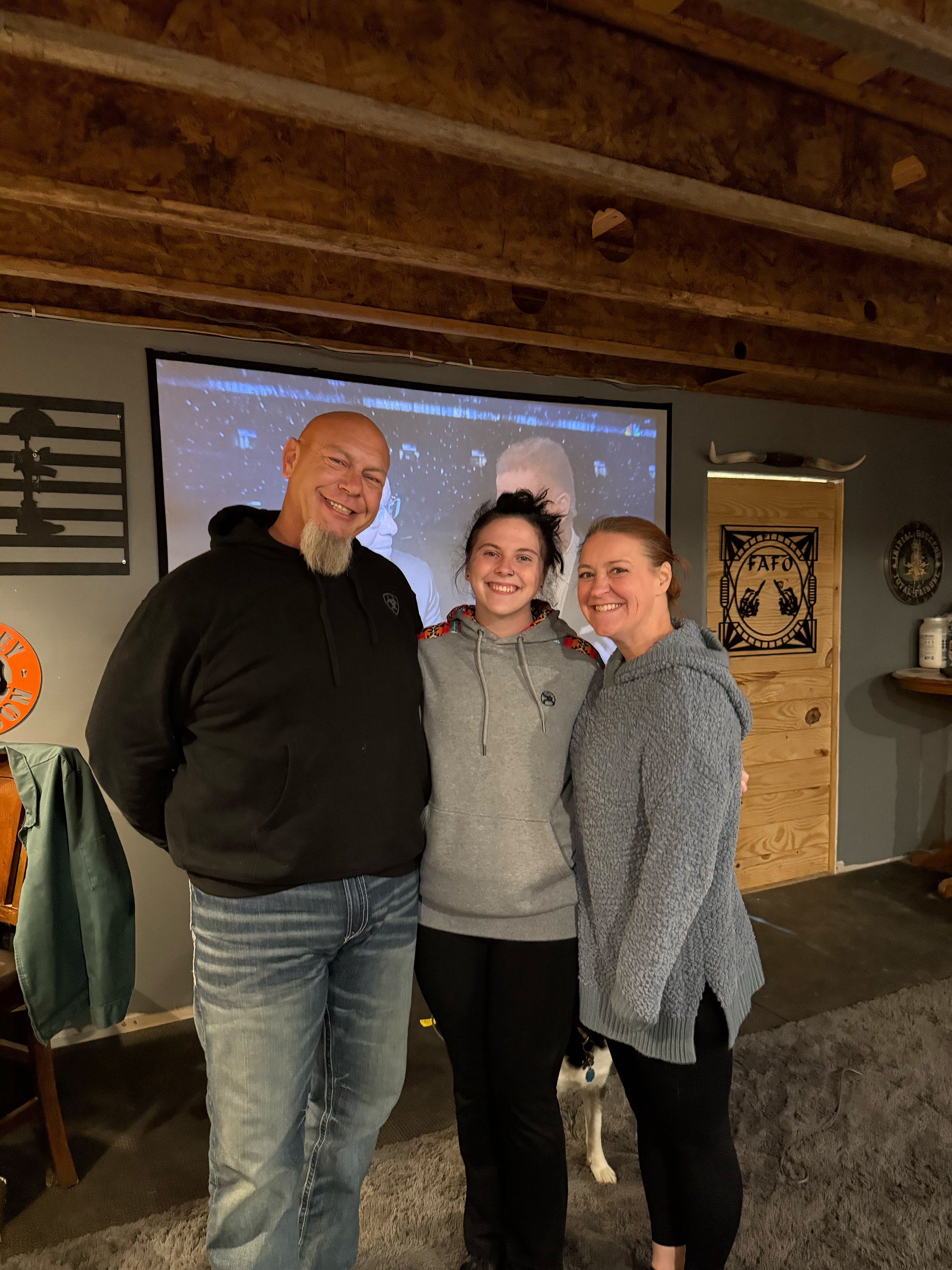 Cheyenne Gregory with her adoptive parents, Melissa and Joe Gregory.