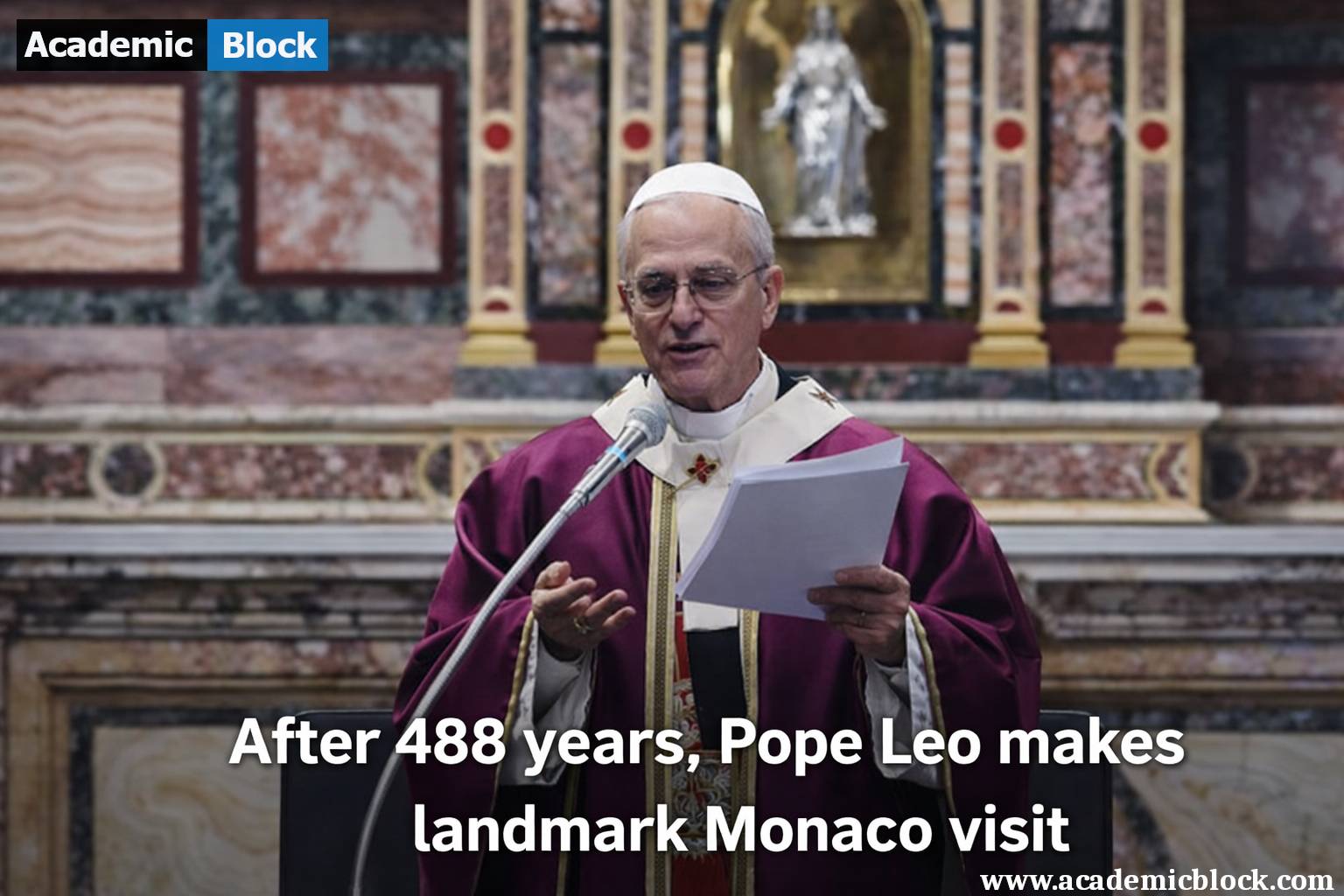 Catholic Pope Leo in ceremonial robes reads from a paper inside a richly decorated church, with a headline about a historic visit to Monaco after 488 years.