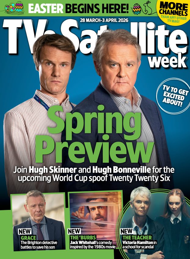 The cover of TV&Satellite Week magazine for the week of 28 March - 3 April 2026. The banner at the top has illustrations of Easter Eggs and bunnies with the text "Easter begins here!", and in the corner "More channels than any other TV mag!"
The main image shows Hugh Skinner as Will Humphries and Hugh Bonneville as Ian Fletcher, with the headline: "Spring Preview - Join Hugh Skinner and Hugh Bonneville for the upcoming World Cup spoof Twenty Twenty Six".
There are three inset images along the bottom: one on the left shows John Simm as Det Supt Roy Grace with the caption "NEW: Grace - the Brighton detective battles to save his son". The middle picture shows Jack Whitehall as Rob Fisher peering through Venetian blinds with the caption "NEW: The 'Burbs - Jack Whitehall's comedy inspired by the 1980s movie". The picture on the right shows Victoria Hamilton as Helen Simpson and Alice Grant as Cressida Bancroft, with the caption "NEW: The Teacher - Victoria Hamilton in a school for scandal".