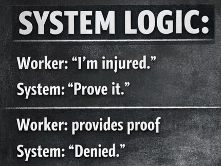 Alt Text : A dark textured meme with white text. Top black banner reads “SYSTEM LOGIC:”. Dialogue below: Worker: “I’m injured.” System: “Prove it.” Then a line separator. Worker: provides proof. System: “Denied.”