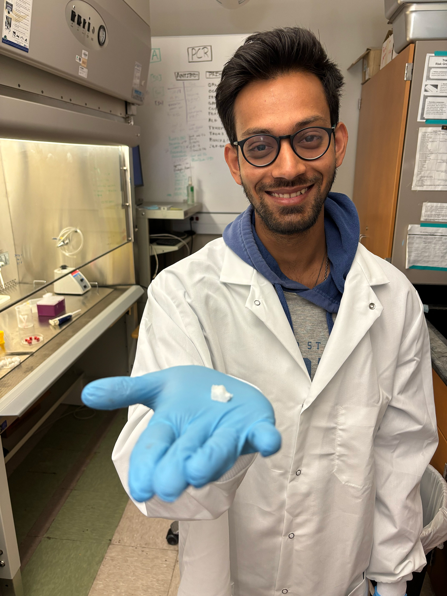 Biomedical engineering doctoral student and researcher Saptarshi Biswas holds a sample of the hemostatic dressing.

Credit: James Cavin/Texas A&M University College of Engineering