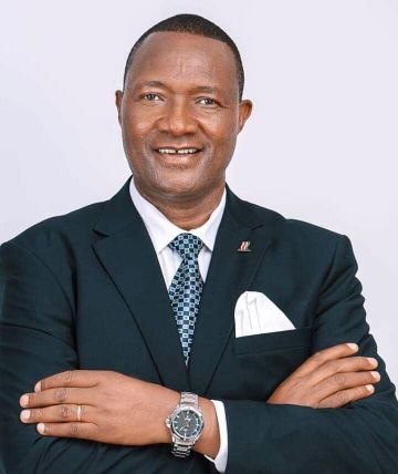 H.E Dr. Kiarie Badilisha