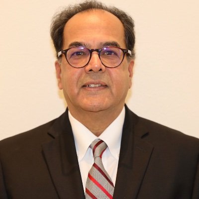 Praveen Sinha (MAGA)